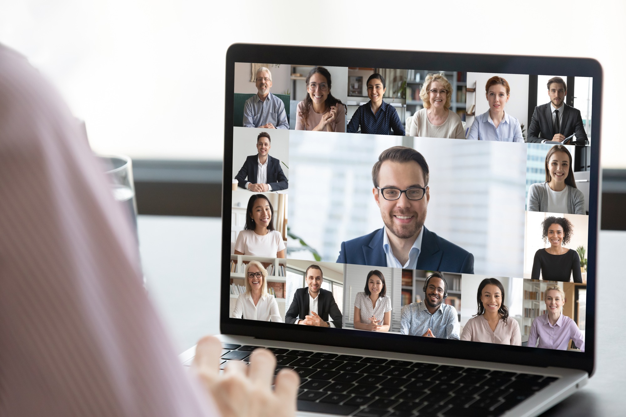 Close up of employee talk on video call on laptop